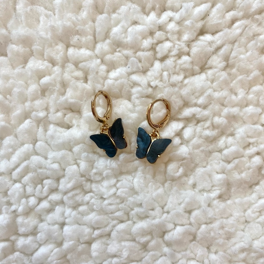 Gold mini hoops with black butterfly charms
